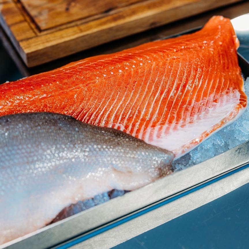 Fresh salmon fillet on ice at High Steaks Smokehouse in Osage Beach