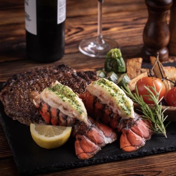 Lobster tails plated surf-and-turf style
