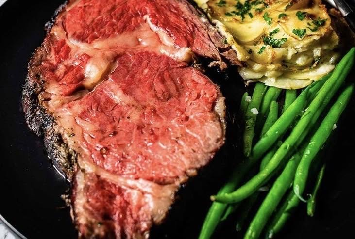 Roasted prime rib plated with sides at the Lake of the Ozarks