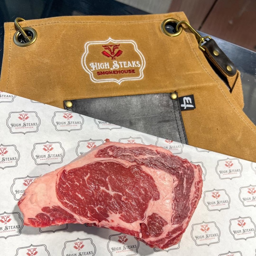 Hand-cut prime ribeye on butcher paper at High Steaks Smokehouse in Osage Beach